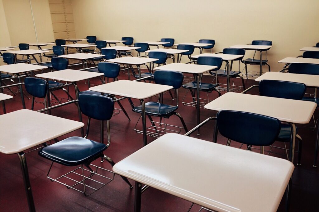 empty high school classroom desks